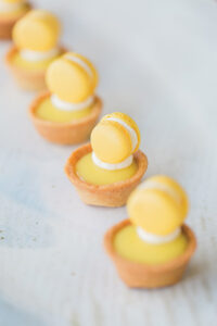 Bergamot and Meyer lemon confit tartlets with baby lemon macrons from Taste Catering & Event Planning.