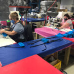 Skilled sewers make masks at Sterno’s plant in La Porte, Ind.